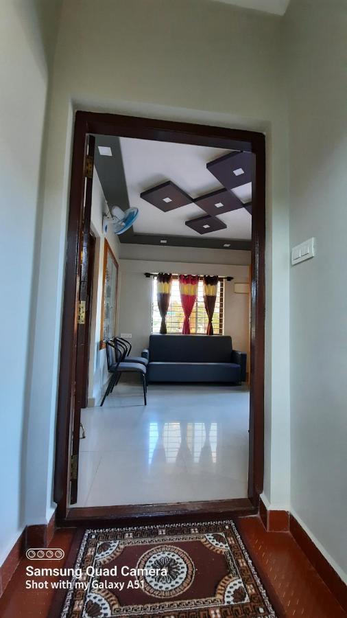 Varam Homestay Мадикери Экстерьер фото